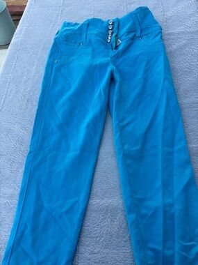Women's Straight Leg Jeans in Bright Turquoise with Decorative Buttons